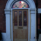 <p>Hemlock door with stained glass.</p>