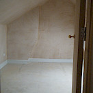 <p>Newly plastered room</p>