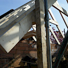 <p>Old hipped roof stripped back and new roof timbers now being fitted.</p>