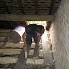 <p>Billy coming through access door. New floor timbers and insulation in between.  Ps it was about 29 degrees outside and extremely hot in that loft !.</p>